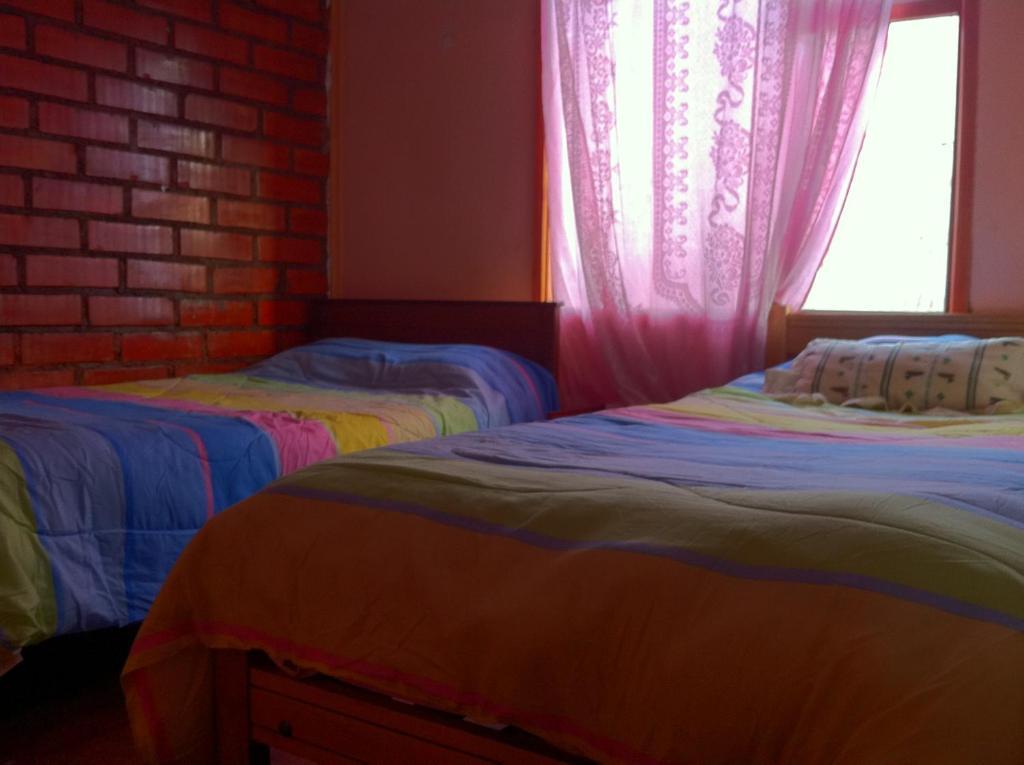 Hostel Melinda Puerto Natales Zimmer foto